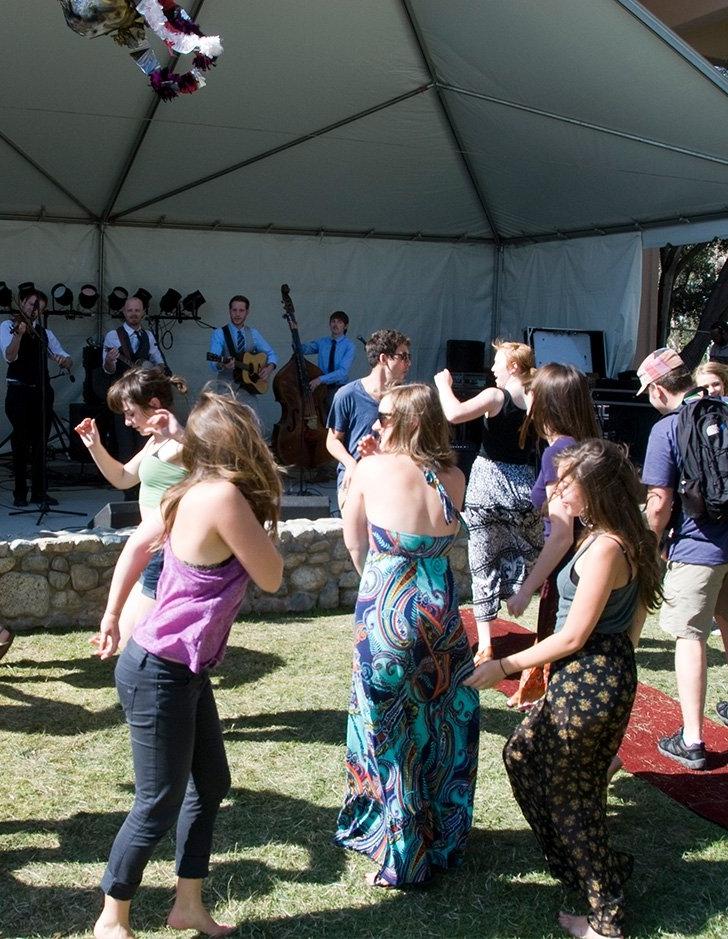 A band plays at McConnell apron while students dance.